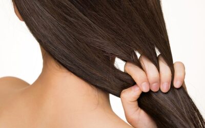 Monsoon Skin & Hair Care Guide 2026 Woman enjoying rainfall representing healthy skin and hair care during the monsoon season.